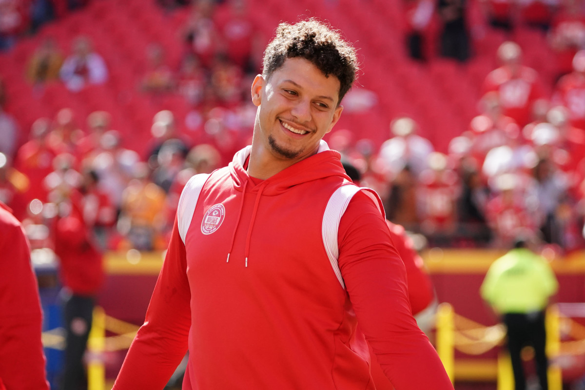 Oct 22, 2023; Kansas City, Missouri, USA; Kansas City Chiefs quarterback Patrick Mahomes (15) laughs during warm ups against the Los Angeles Chargers prior to a game at GEHA Field at Arrowhead Stadium. Mandatory Credit: Denny Medley-USA TODAY Sports  